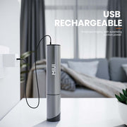 USB rechargeable MIUI Mini Vacuum Cleaner in sleek design on a modern table.